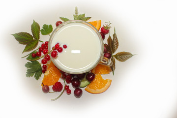 drink with milk, fruit and fresh berries.  Good weight loss concept.  yogurt drink, vitamin cocktail.