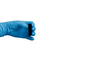 scientist hand holding  laboratory equipment  with blue latex glove isolated on white background