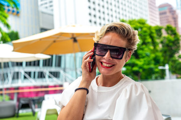 Portrait Caucasian business woman talking on mobile phone