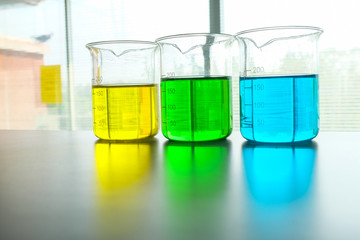 colorful beaker in laboratory
