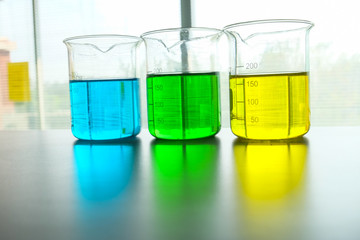 colorful beaker in laboratory