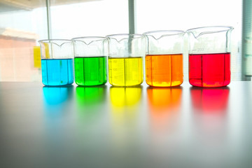 colorful beaker in laboratory