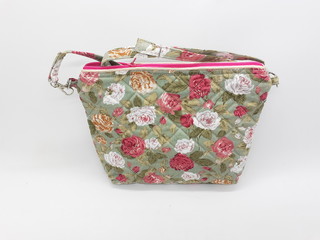 Artistic Beautiful Cute Fabric Female Purse with Floral Retro Pattern in White Isolated Background