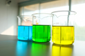 colorful beaker in laboratory