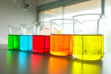 colorful beaker in laboratory