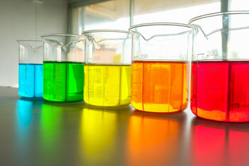 colorful beaker in laboratory