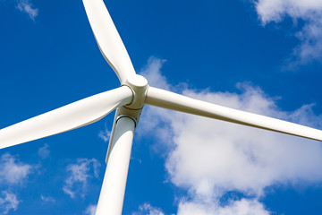  Wind turbine is alternative electrical power with blue sky, summer field, renewable energy