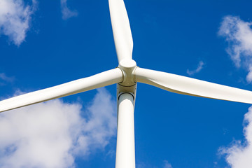  Wind turbine is alternative electrical power with blue sky, summer field, renewable energy