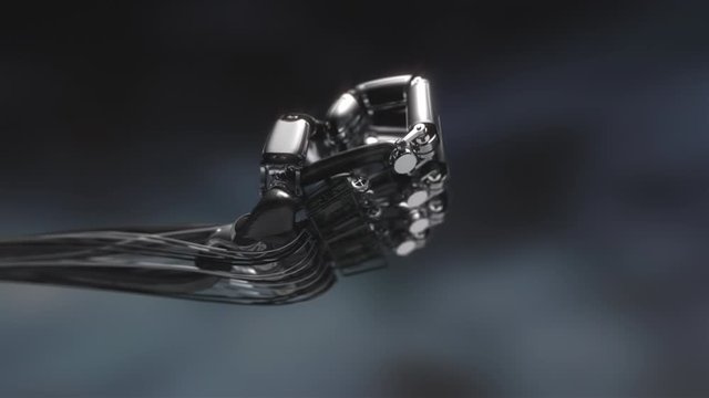 Robot hand. CG render of robot hand animated to show off dexterity of hand and finger movement. Demonstration of robotics.