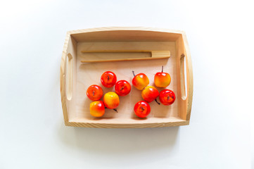 Montessori material. Sort fruit harvest. Maths account apples.