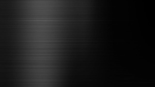 Light motion on black steel metal background