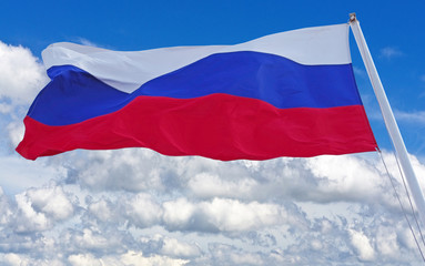 Russian flag waving in the wind over blue sky