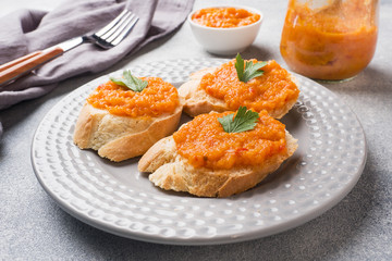 Sandwiches with bread zucchini caviar tomatoes onions. Homemade vegetarian food. Copy space.