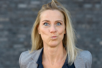 Portrait of middle-aged woman making a funny face