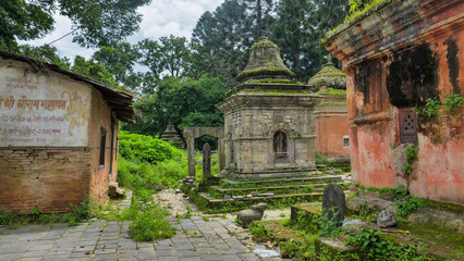 Fototapeta na wymiar Old architecture and ancient religion buildings in the area of Pashupatinath temple in Kathmandu, Nepal
