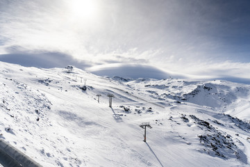 Ski resort of Sierra Nevada in winter, full of snow. - obrazy, fototapety, plakaty