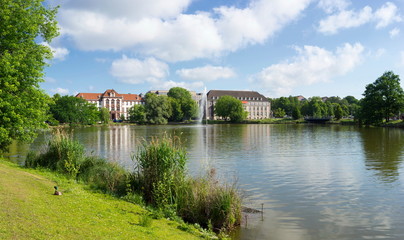 Fototapeta premium Panoramic view of the city hall against the lake, Kiel