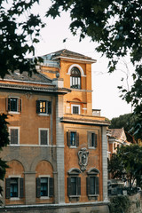 Fototapeta na wymiar Architecture and buildings of old Italy. Evening panorama of the streets of Rome.