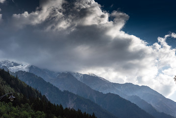 Summits of Alps in clouds, Chamonix, France.