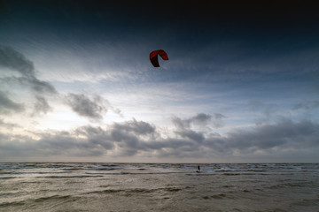 Kiteboarding in stormy day, Liepaja, Latvia.