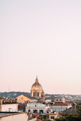 Architecture and panoramas of the old city. Sunset and streets of Rome in Italy.