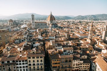 Fototapeta na wymiar Panoramas and sights of the evening city. Santa Maria at sunset in Florence.