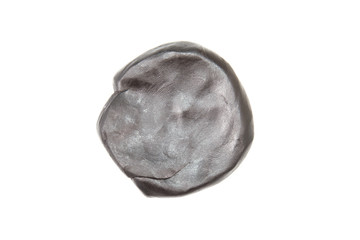 Black plasticine isolated on white background.