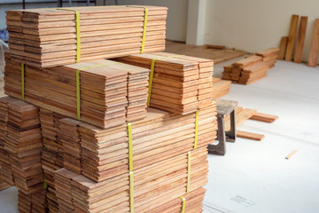 Stack of Parquet wood slice for flooring. Wood timber construction material.