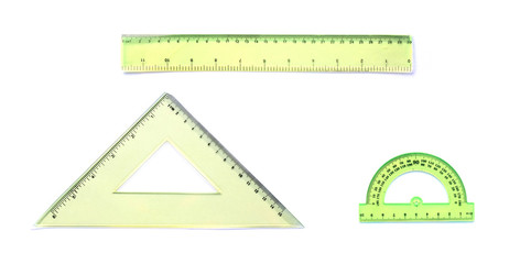 Plastic circular protractor with a ruler on white background.