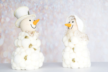 Happy smiling snowman couple. Snowwoman. Christmas Decoration
