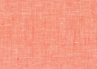 Coral color linen fabric with visible weave texture. Expensive natural suit. High resolution