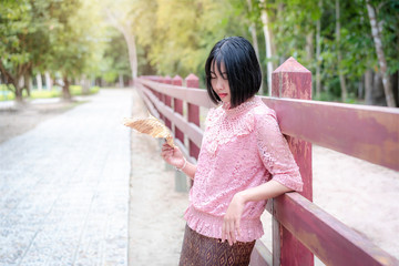 Naklejka premium freedom, standing, white, cheerful, girl, beautiful, casual, lonely, attractive, natural, pretty woman, female, happy, beauty, model, asian woman, spring, smile, caucasian, face, fashion, lady, charmi