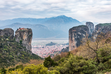 Landscape in Meteora with the monastery of Agia Triada and the town of Kalabaka