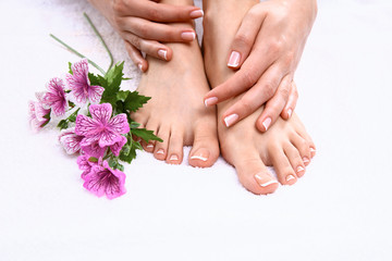 Closeup photo of a beautiful female feet with pedicure