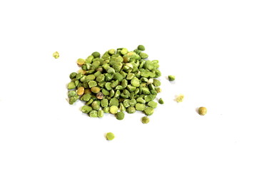  Dry green peas on a white background. Pea texture.  Chipped dry peas for soup.