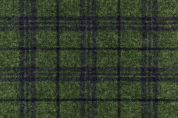 Purple and grey stripes on green grass color woolen fabric. Rich tones. Country windowpane tweed...