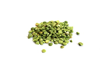  Dry green peas on a white background. Pea texture.  Chipped dry peas for soup.