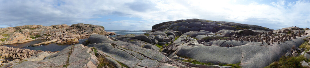 Panoramic landscape of the island of Smogen and Hallo. Cracked islands of pink granite. Sotenas, Vastra Gotaland, Bohuslan, Sweden.
