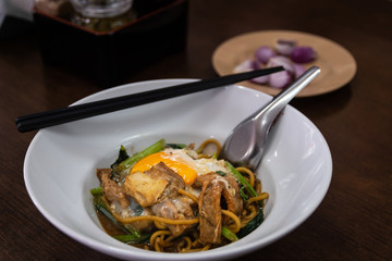 Chinese fried noodles with pork And Cantonese vegetables, Hokkien Noodles, Phuket traditional food