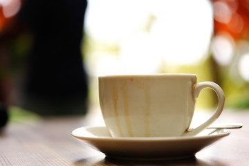 A cup with traces of the flow of coffee