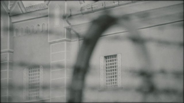 Prison building from Eastern Bloc during communist era (1940s, 1950s).
Archive, black and white footage.