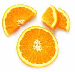 Sliced ​​Orange. Different shaped pieces of fruit.