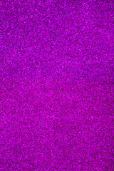 Vibrant purple glitter background, selective focus