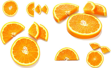 Sliced ​​Orange. Different shaped pieces of fruit.