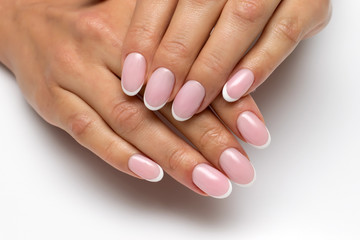 Classic manicure. Wedding nail design. White manicure. French manicure on oval nails.