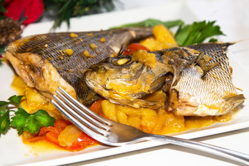 Traditional Christmas dinner, fish stewed with potatoes