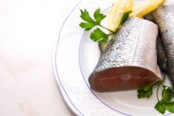 fresh fish, salmon tails on the plate