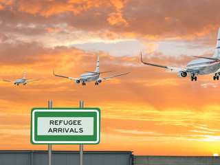Digital composite and 3D illustration of three passenger jet airliners flying into a red sky sunset with a refugee arrivals street sign and top of a fence in the foreground    - Powered by Adobe