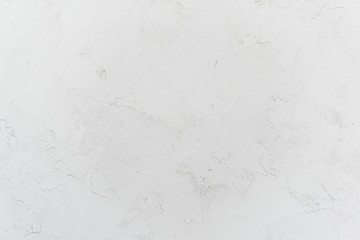 White stucco wall background. White painted cement wall texture