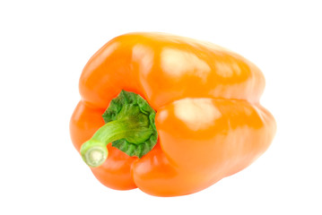 Fresh bright orange peppers on a white background.